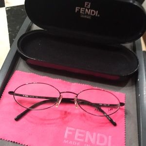 Fendi F559 onyx Black oval glasses. Never owned. Fendi case. Made in Italy